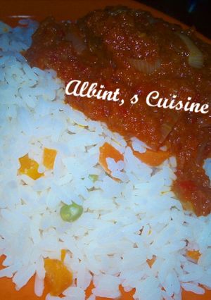 A picture of Coconut rice and stew.