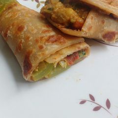 Peanut aloo capsicum roll A picture of Peanut aloo capsicum roll.