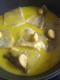 Una foto de Bacalao al pil pil