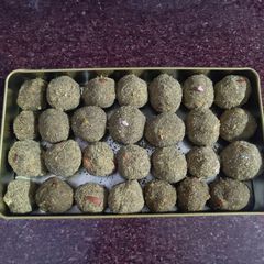 A picture of Green moong ladoo.