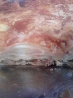 Una foto de Lasaña de carne, choclo, jamón y queso