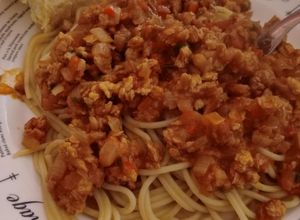 Una foto de Fideos con tuco vegetariano
