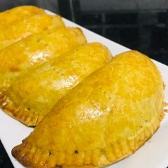 A picture of Meatpies and Sour mayonnaise dip.