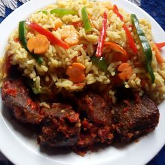 A picture of Vegetable and tomatoes stir fried rice.