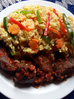 A picture of Vegetable and tomatoes stir fried rice.