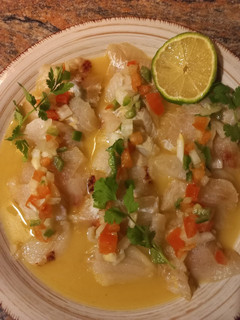 Una foto de Sashimi con ají amarillo