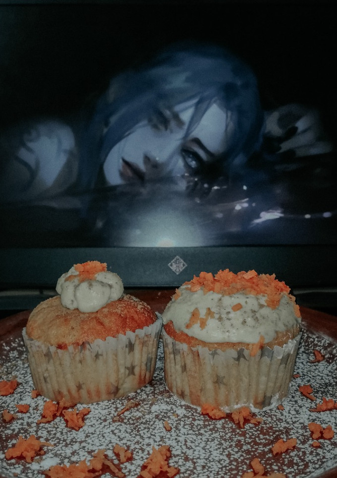 Una foto de Muffins de zanahoria y naranja con cobertura de queso crema