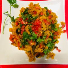 A picture of Red Poha bishi bale poha (Karnataka Special).