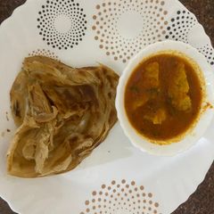 A picture of Besan Sabzi With Lachha Paratha.