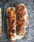 Calabacines rellenos con bechamel y queso al horno