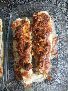 Una foto de Calabacines rellenos con bechamel y queso al horno