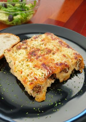 Una foto de Canelones con carne del caldo