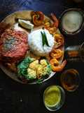 Prawns in Pumpkin leaf(Kumro patay chingri)