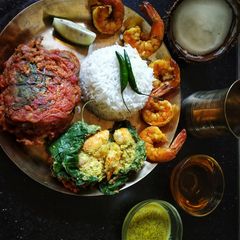 A picture of Prawns in Pumpkin leaf(Kumro patay chingri).
