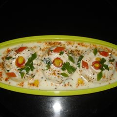 A picture of (Non fried-Semolina(Sooji) steamed Dahi wada).