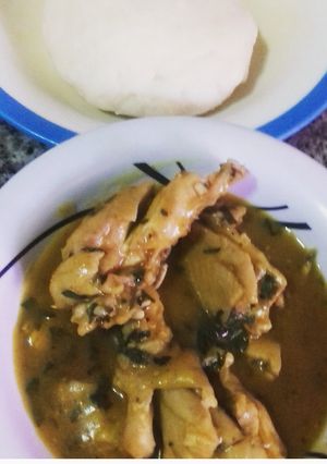 A picture of Ofe nsala with chicken and pounded yam.