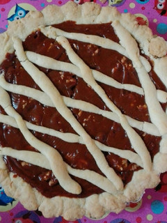 Una foto de Tarta de dulce de leche y nueces