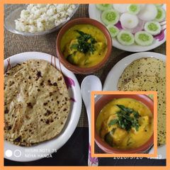 A picture of Punjabi kadhi pakora thali.