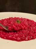 “Risotto rosso al pate’ di sardine e cappero”
