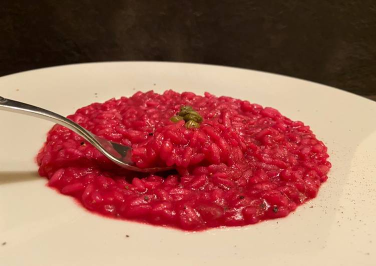 Steps to Make Veloce “Risotto rosso al pate’ di sardine e cappero”