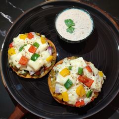 A picture of Veg garlic bread pizza.