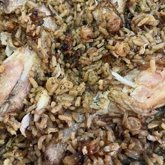 A picture of Chicken with rice & raisins.