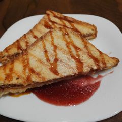 A picture of Peanut Butter jelly sandwich.