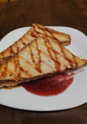 A picture of Peanut Butter jelly sandwich.
