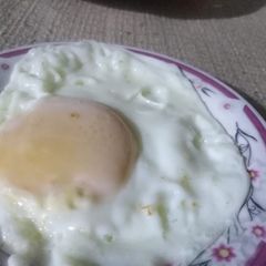 A picture of Half fry egg.