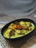 Opor Ayam bumbu Kuning