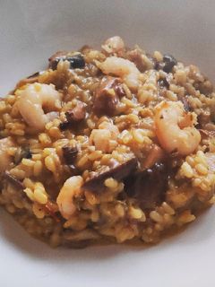 Una foto de Risotto de setas y gambas