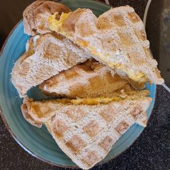 A picture of Waffle iron egg sandwich 💣.