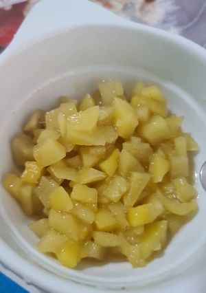 Una foto de Dulce de mango verde en almíbar