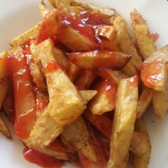 A picture of Oven baked and spicy potato.