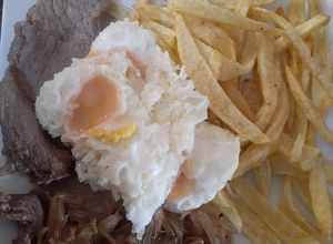 Una foto de Bistec a lo pobre