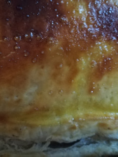 Una foto de Empanada de champiñón, queso lonchas y jamón dulce