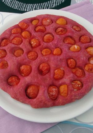 A picture of Pink Focaccia with Cherry Tomatoes.