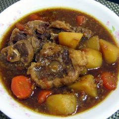 A picture of Oxtail With Potato And Carrot Stew.