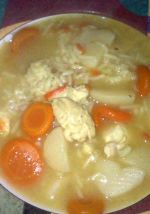 A picture of homemade chicken n! rice soup.