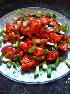 A picture of Dry Chilli Chicken.