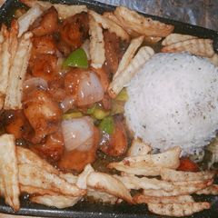 A picture of Chicken in Mango and honey Chilli sauce.