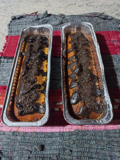 Una foto de Budín de naranja con cobertura de chocolate 🍫
