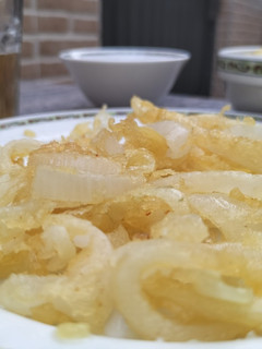 Una foto de Cebolla frita