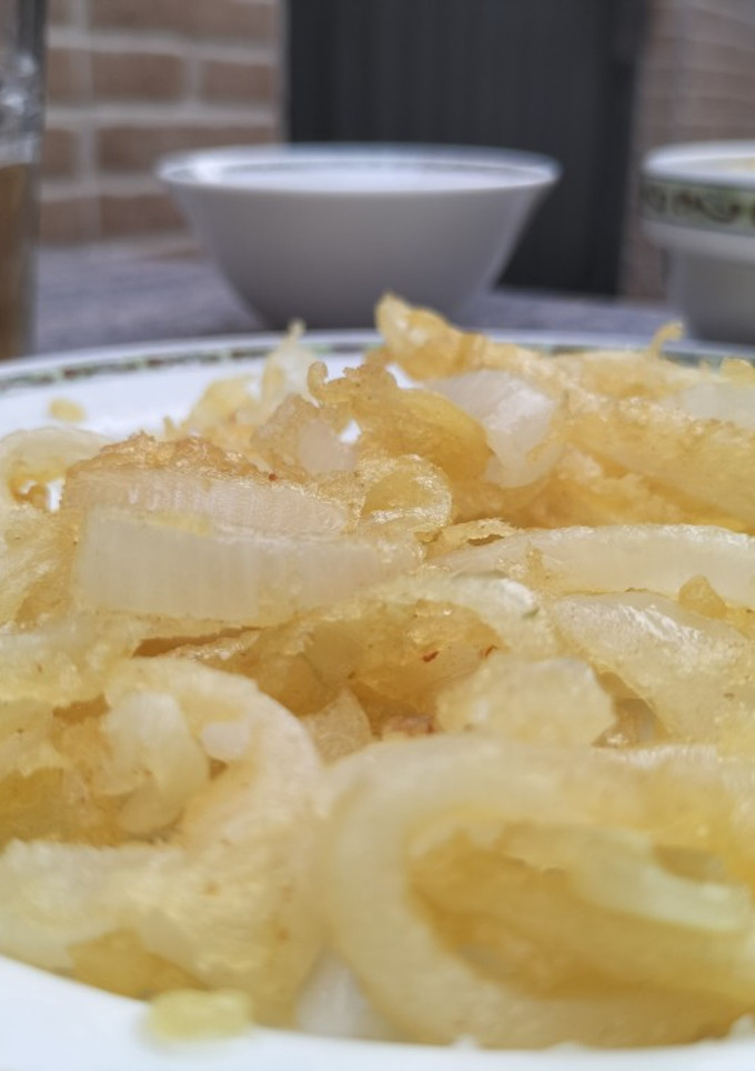 Una foto de Cebolla frita