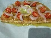 Una foto di pesce spada al forno