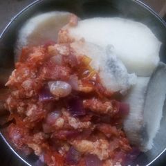 A picture of Boiled yam and egg sauce.