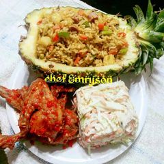 A picture of Pineapple fried rice/coleslaw/pepper chicken 🔥 🔥.