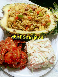 A picture of Pineapple fried rice/coleslaw/pepper chicken 🔥 🔥.