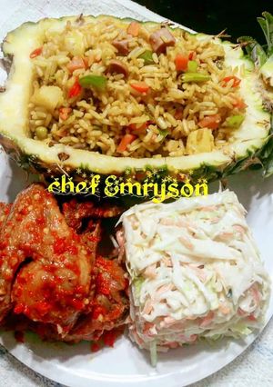 A picture of Pineapple fried rice/coleslaw/pepper chicken 🔥 🔥.