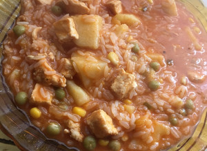 Una foto de Guiso de arroz con suprema